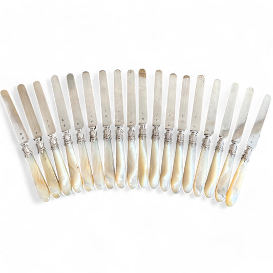 Mother-of-pearl and silver cheese knives, 18 pieces, 19th century
