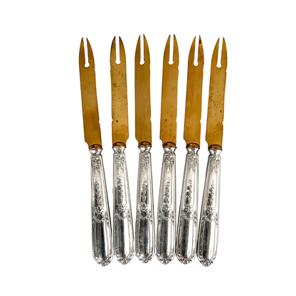 Antique melon knives, in argent fourrré and gilt metal