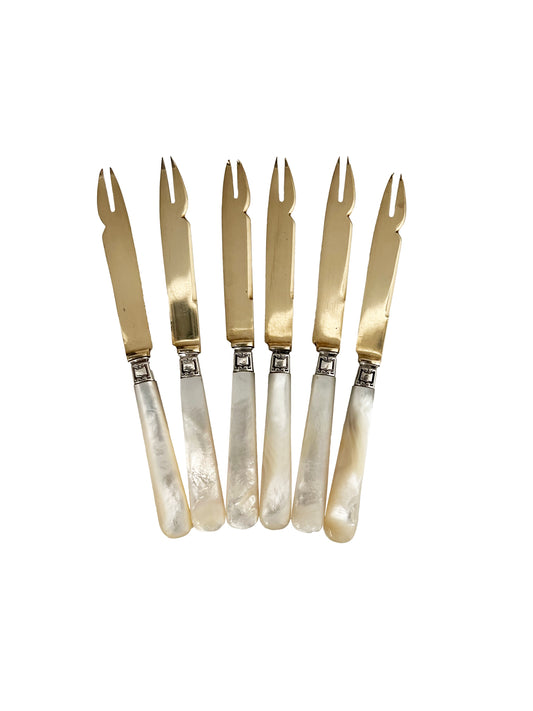 Melon knives and forks in mother-of-pearl and gold-plated metal
