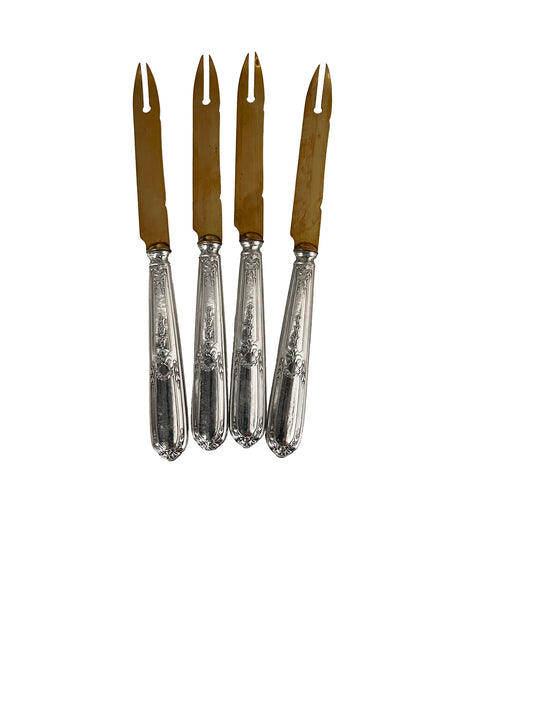 Antique melon knives, in argent fourrré and gilt metal