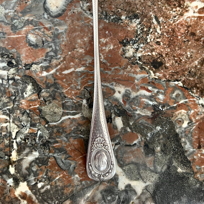 Cuillère à saupoudrer